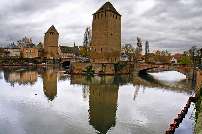 Towers and bridge over a river in France