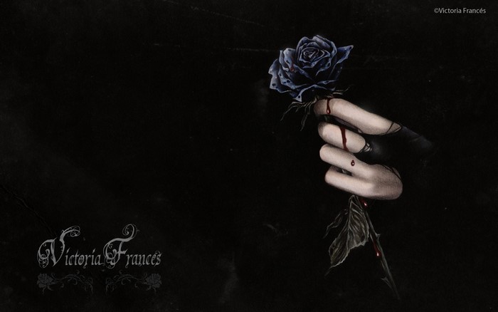 Victoria Frances with a bloody blue rose