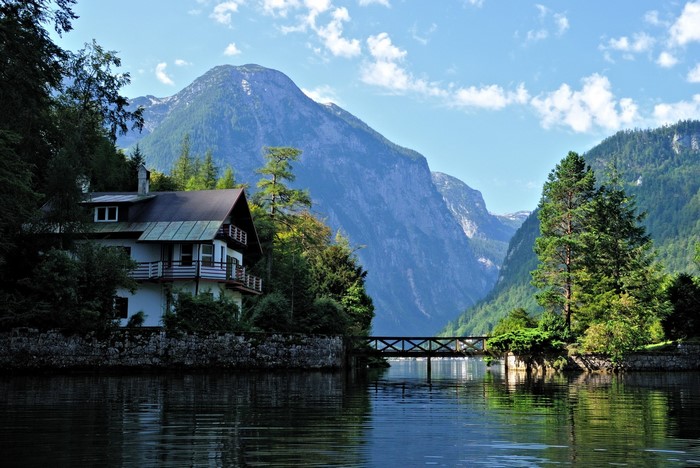 House and bridge over lake in Hallstatt, Austria