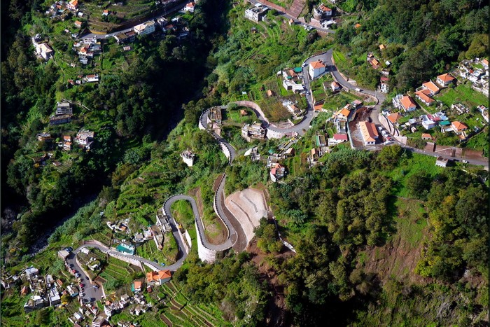 Aerial view of a winding road and village in Portugal