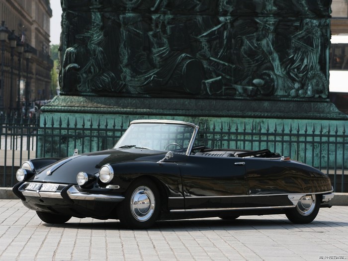 Black Citroen DS Convertible parked on cobblestone street