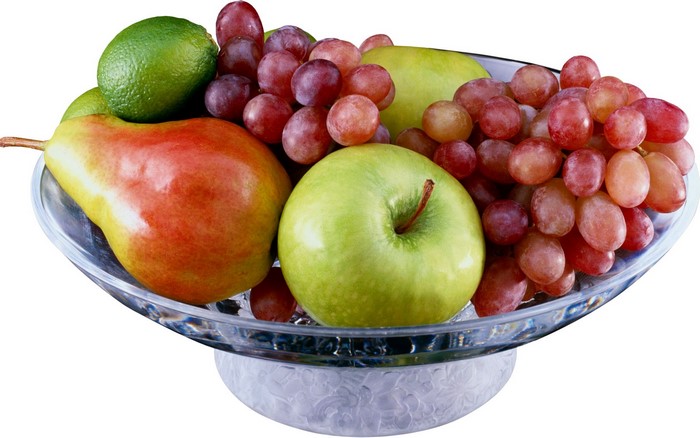 Fruit bowl with grapes, apples, pear, and lime