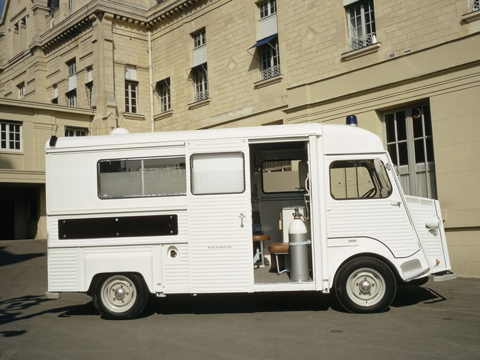 White Citroen ambulance parked in front of a building
