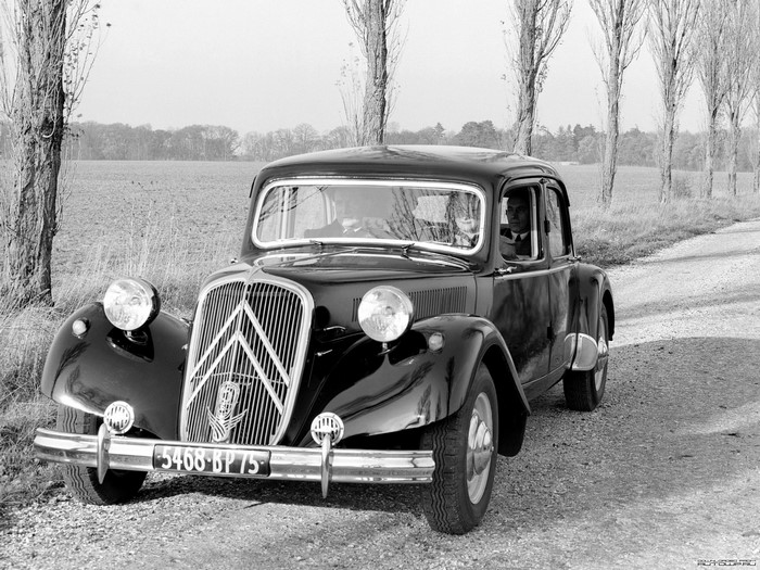 Black Citroen car on a rural road