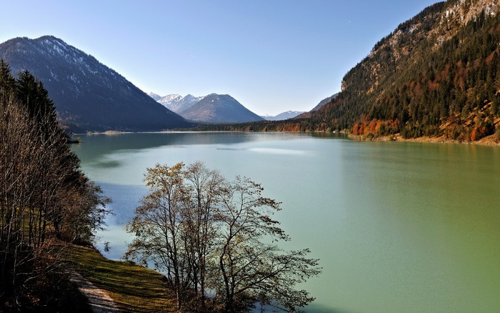 Lake surrounded by mountains and trees
