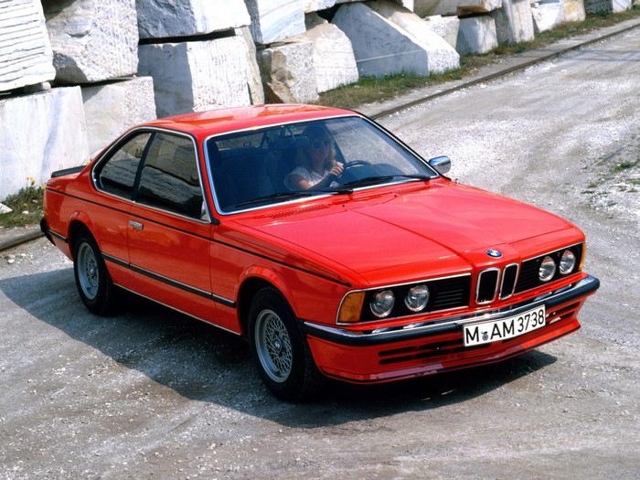 Red BMW 6 Series Coupe on Gravel
