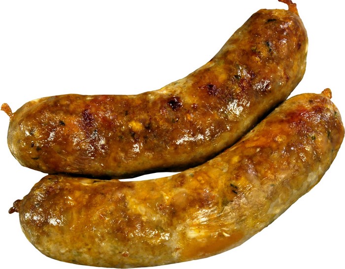 Two cooked sausages on a white background