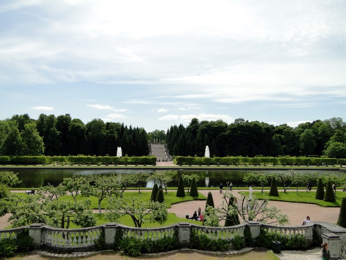 Grand park with fountains and manicured trees