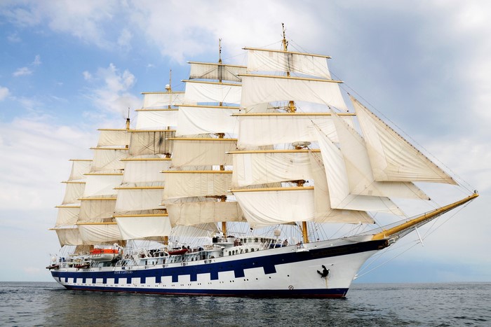 Tall Ship with Full Sails on the Water