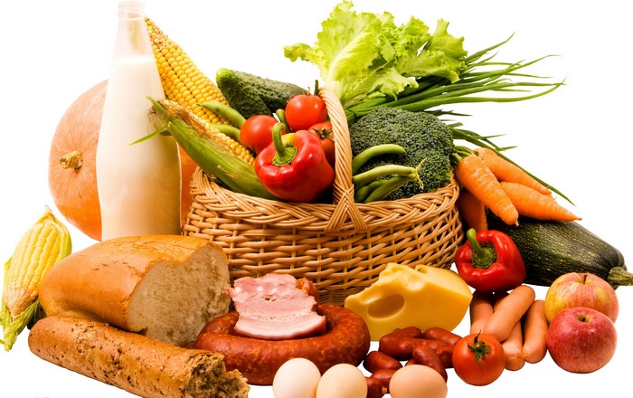 Assortment of fresh vegetables, bread, dairy, and meat