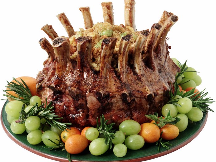 Crown roast of pork with stuffing and fruit garnish