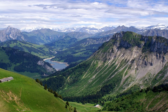 Mountain landscape with lake and snow-capped peaks in Switzerland