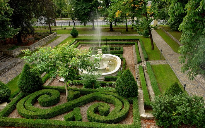 Formal garden with fountain and topiary in Wroclaw, Poland