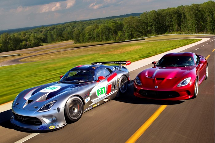 Two Dodge SRT Viper GTS cars on a race track