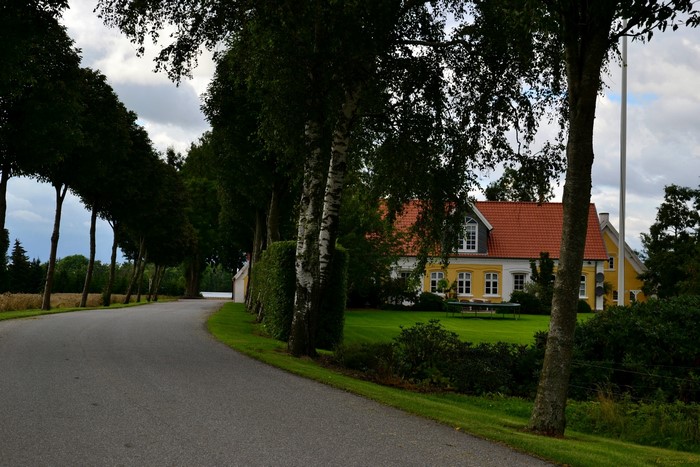 Yellow house with red roof in Syddanmark, Denmark