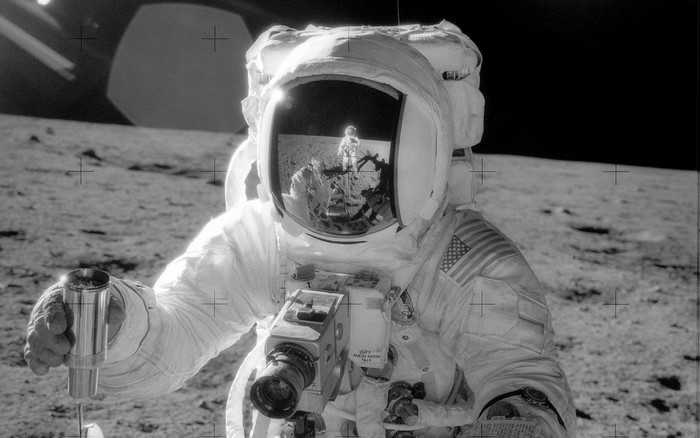 Astronaut on the Moon with Camera