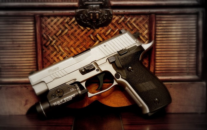 SIG Sauer P226 pistol with TLR-1 light