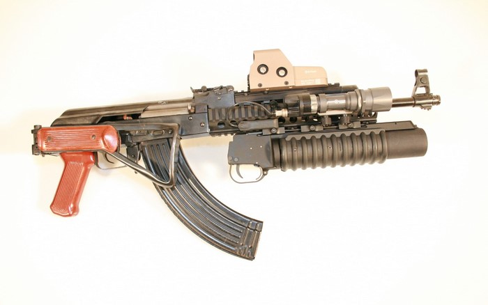AK-47 assault rifle with grenade launcher and red dot sight