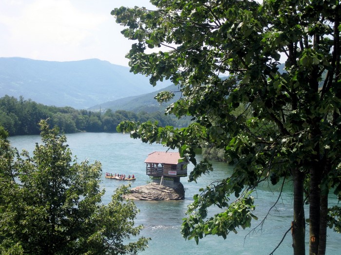 House on a rock in the Drina River with rafters