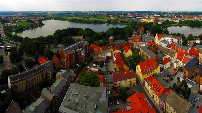 Aerial view of a German city with lakes and buildings