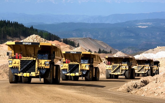 Caterpillar mining trucks in a quarry