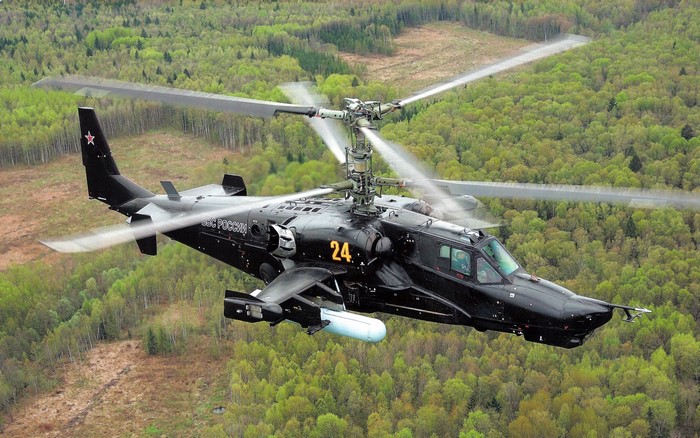 Black Kamov Ka-52 "Alligator" attack helicopter in flight