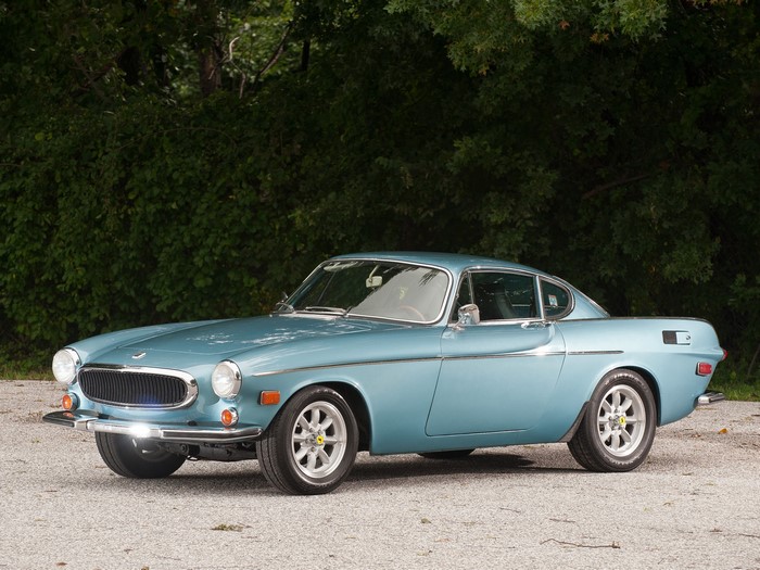 Blue Volvo P1800 Coupe parked outdoors