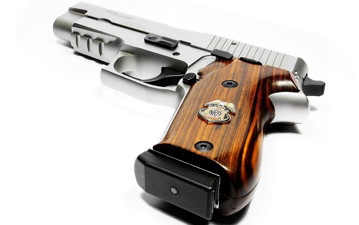 SIG Sauer P226 NRA pistol with wood grips