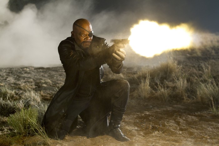 Nick Fury firing a gun in The Avengers
