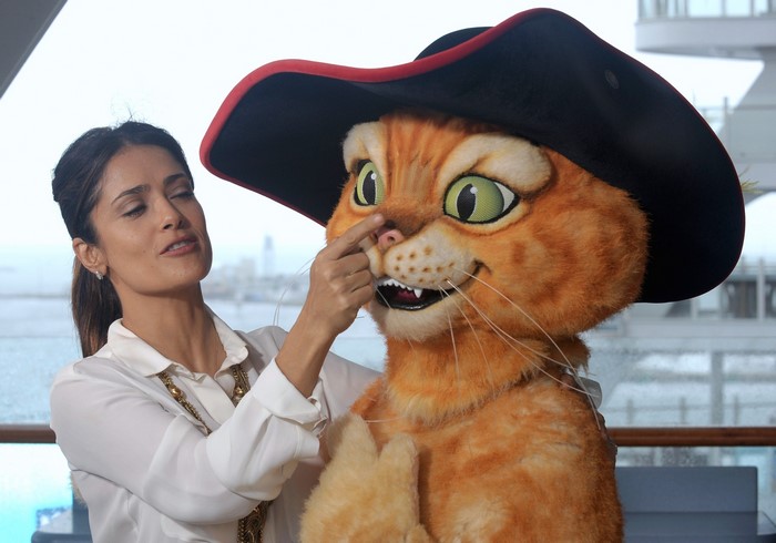 Salma Hayek with Puss in Boots character