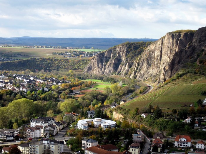 View of a town nestled beside a rocky mountain in Germany