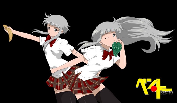 Two girls from Ben-Tou with a banana and grapes