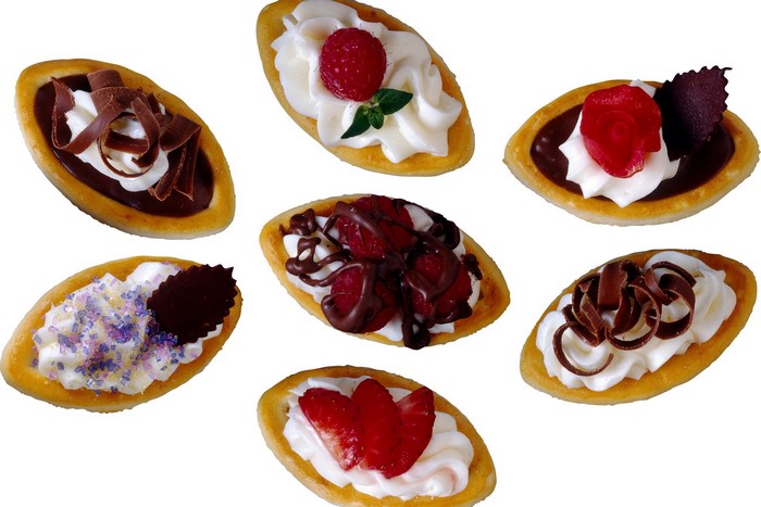 Assortment of decorated mini tarts