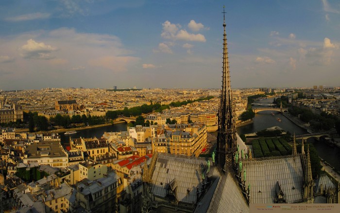 Paris skyline with Notre Dame spire and Seine River