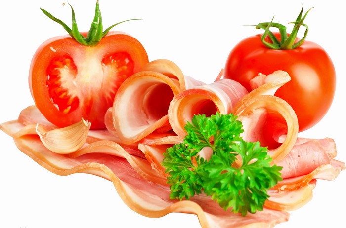 Sliced ham with tomatoes, garlic, and parsley