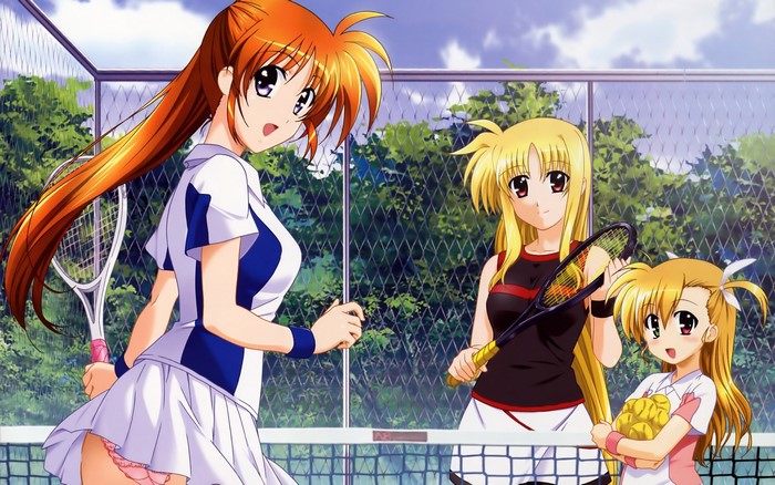 Three girls playing tennis