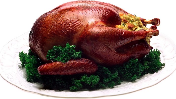 Roasted Turkey with Stuffing and Parsley Garnish