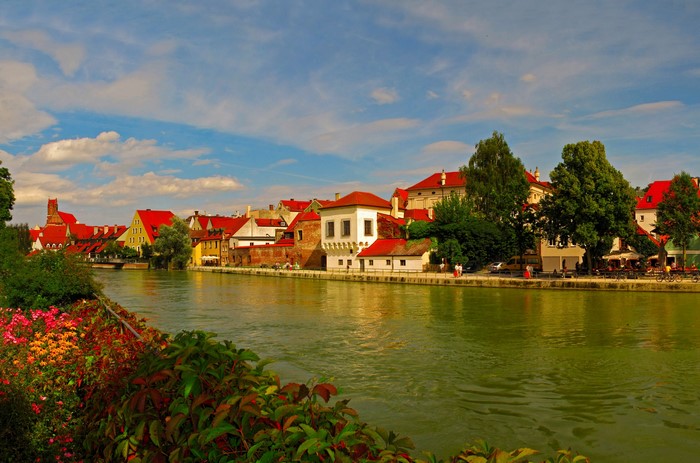 Riverfront town with red roofs in Germany