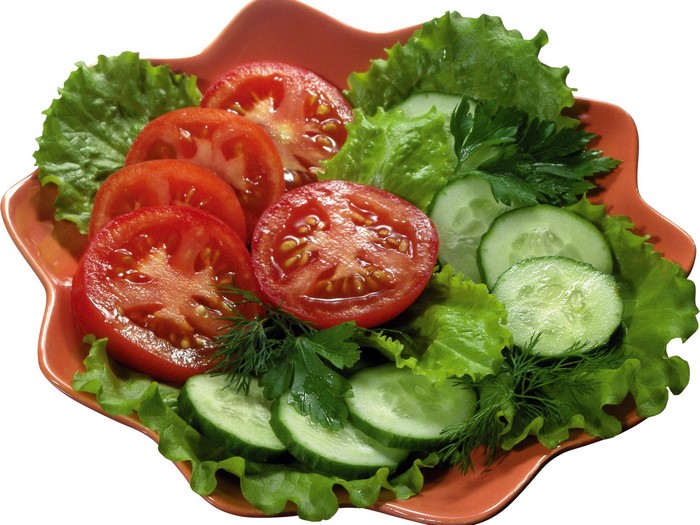 Salad with tomatoes and cucumbers on a plate