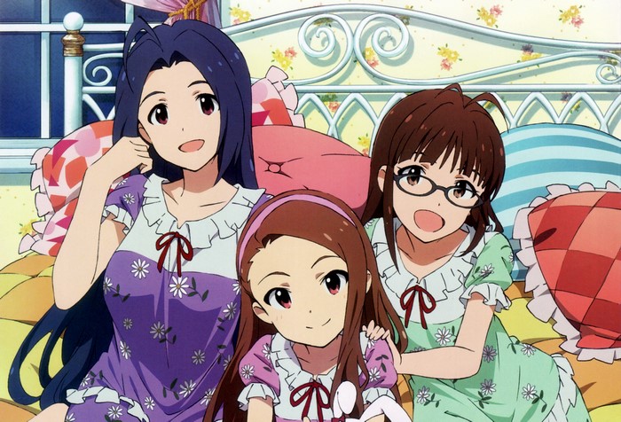Three girls in pajamas in a bedroom