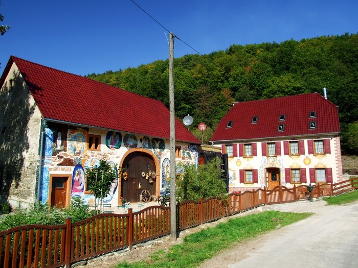 Two decorated houses with red roofs in Germany