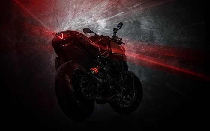 Red BMW motorcycle with red light effects