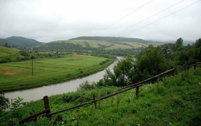 River valley with green fields and hills in Ukraine