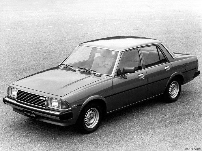 Mazda sedan parked on asphalt