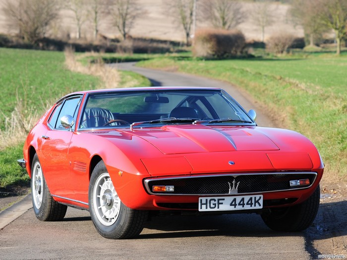 Red Maserati on a Country Road