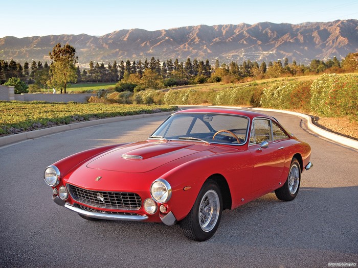 Red Ferrari 250 GT Berlinetta by Pininfarina on a Road