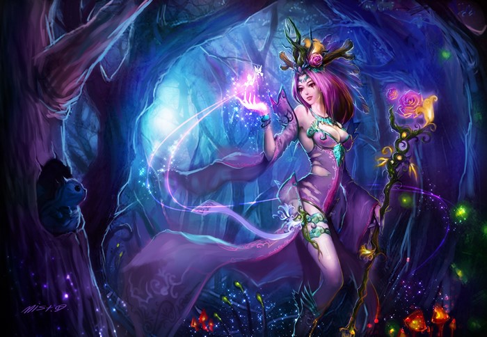 Fairy sorceress with staff in enchanted forest