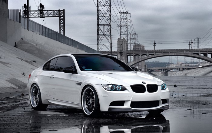 White BMW M3 Coupe on Wet Road