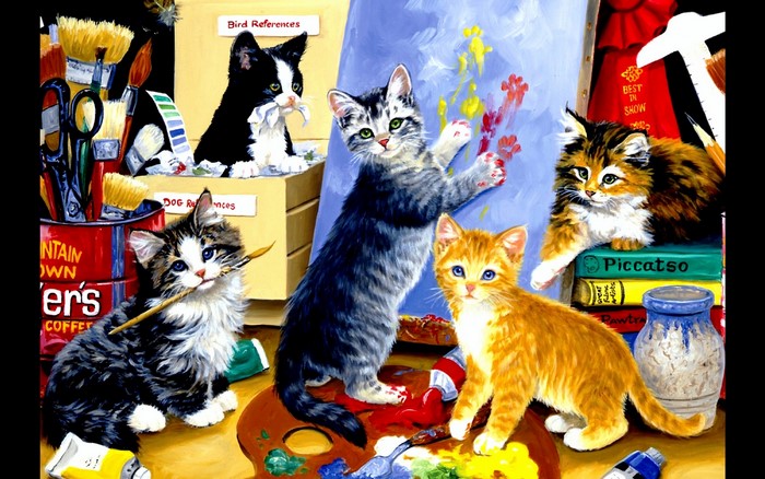 Kittens painting with art supplies