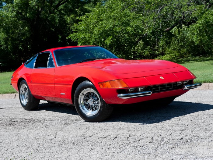 Red Ferrari Daytona parked on asphalt